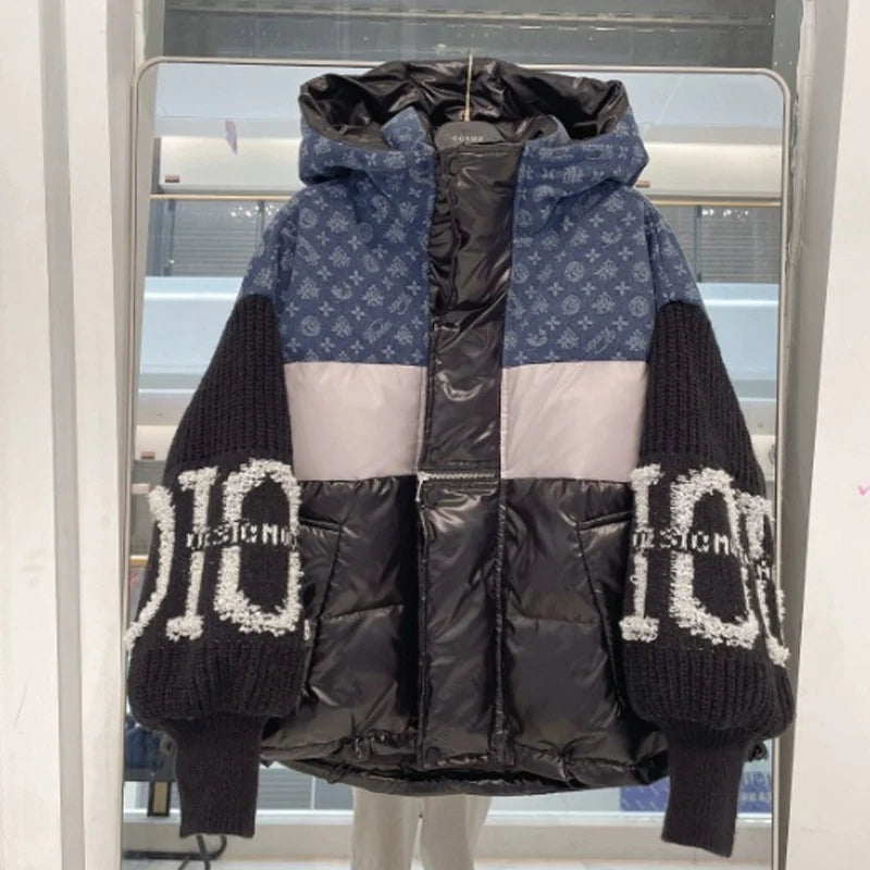 GIACCA IMBOTTITA CON CAPPUCCIO E MANICHE IN PATCHWORK